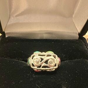 Ring with Scroll design and inlayed stones